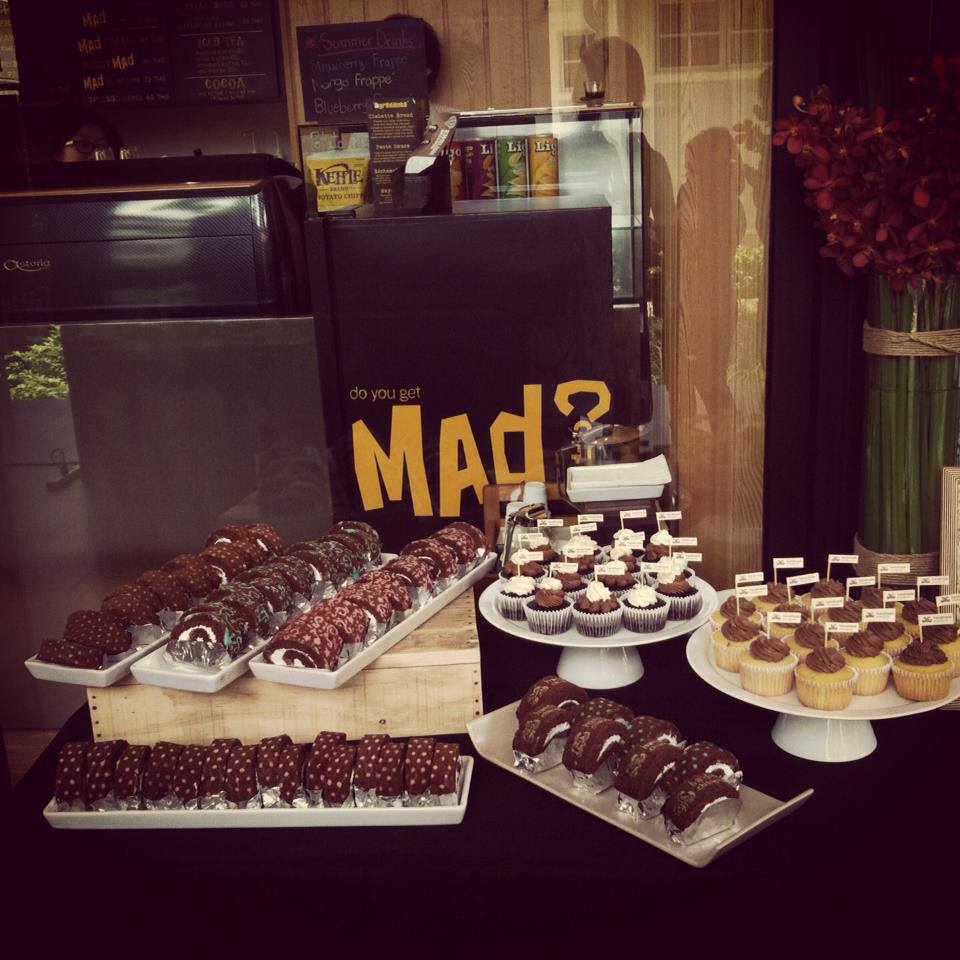 Dessert counter with sweets at Into the Woods Cafe