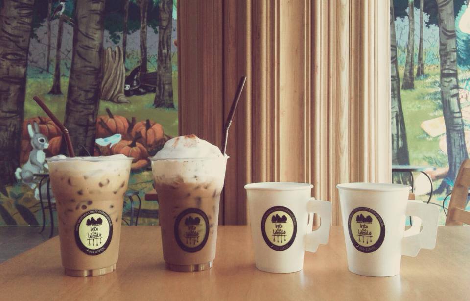 Branded drinks by the window at Into the Woods Cafe